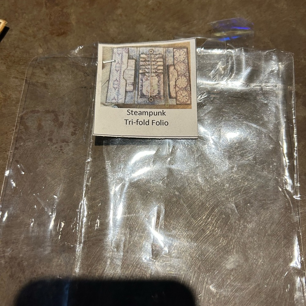 Steam punk tri fold piortfolio